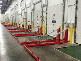 Spill retention barrier for loading docks